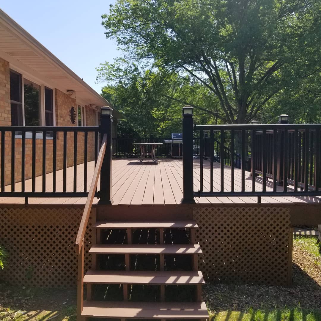 Composite decking with aluminum rail and stairs